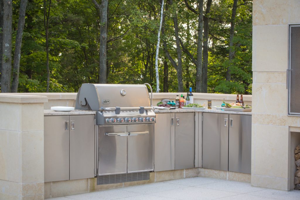 Outdoor kitchen and grill on patio